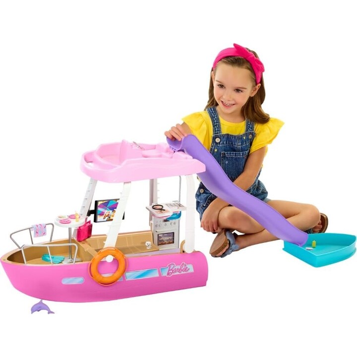 Set de Barbie Dream Boat con barco, piscina y tobogán. Incluye más de 20 piezas, como un delfín y otros accesorios.